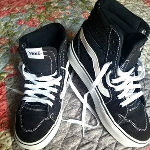 Women's High top platform Van's. Size    7 1/2. Black and white.